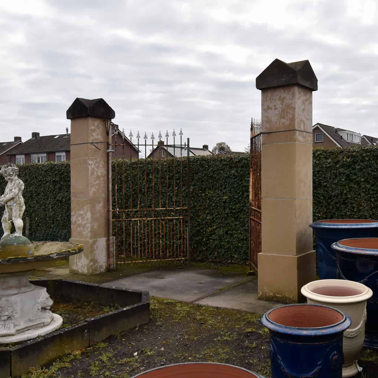 Zandstenen-poortpalen