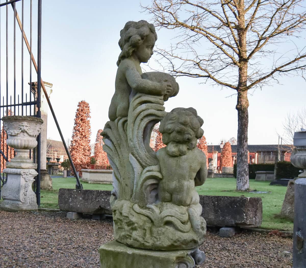 Fontein-sproeier-kinderen-met-kruik