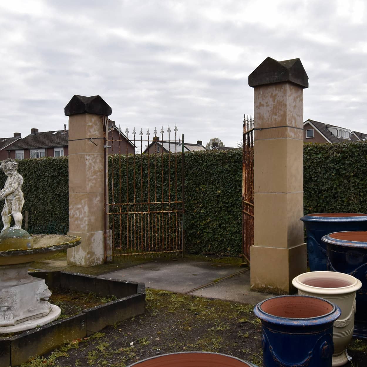 Zandstenen-poortpalen